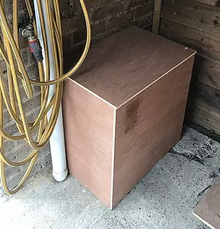 A plywood insulated outside cabinet